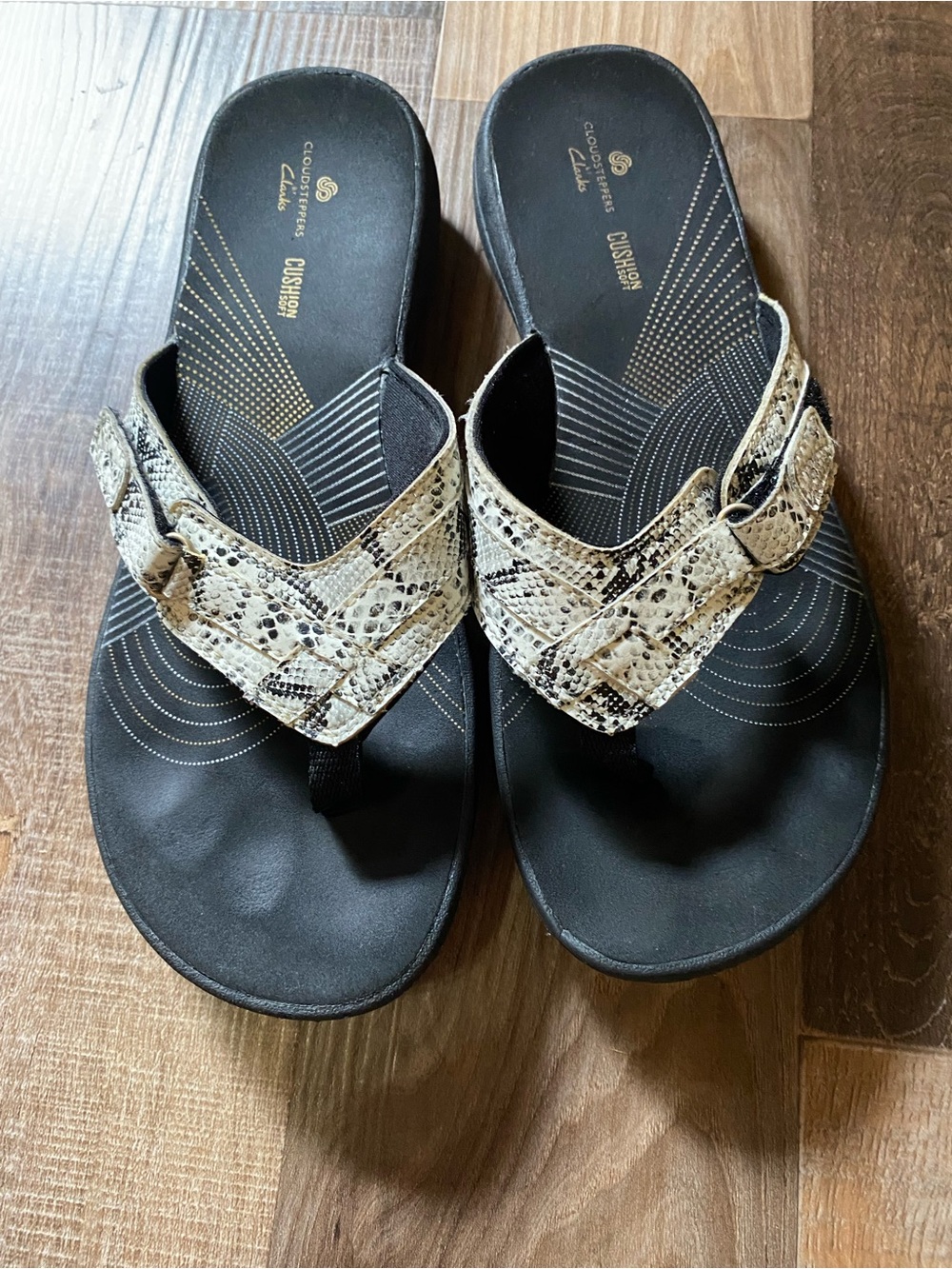 Clarks Women’s Black Footbed Thong Sandals with Snake-Print Cream Straps